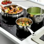 ⁦البا الايطالية - سطح بلت ان كهرباء 60 سم - 4 مناطق الطهي الفردي - التحكم باللمس مع 9 أوضاع للطهي - وظيفة التعزيز متاحة في جميع مناطق الطهي الأربعة - مؤقت مدمج يصل إلى 99 دقيقة لكل منطقة طهي - AS ELIO 345-005 IB⁩ - الصورة ⁦4⁩